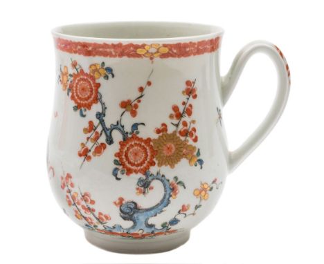 A First Period Worcester mug: of bell shape with ridged loop handle, painted in the Kakiemon style with the 'Quail' pattern, 