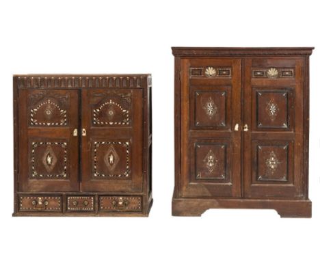 A 17th Century and later Continental oak, ivory and ebony inlaid side cupboard:, now in two parts, having chequer and dentil 