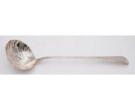 A George III silver Old English pattern soup ladle, maker Alexander Barnet, London, 1783: with feathered edge and shell-shape