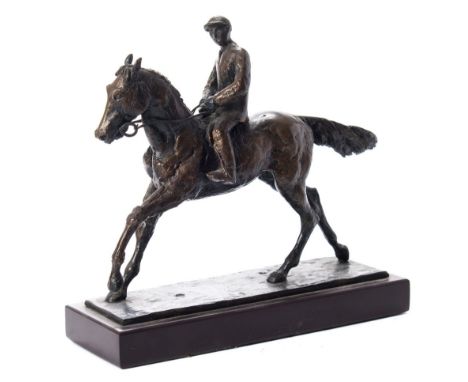 Catharni Stern (1925 - 2015)A bronze study of a show jumper and rider:, on a rectangular base, signed and dated 1988, 21cm. h
