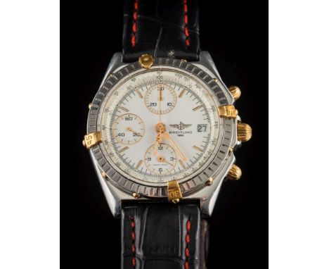 Breitling. A gentleman's stainless steel automatic chronograph, chronomat wristwatch: the off-white dial 31mm diameter with b