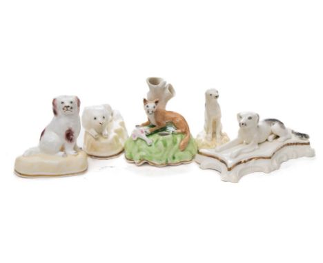 Five Samuel Alcock porcelaineous animal groups: comprising four dogs including a King Charles spaniel and a poodle together w