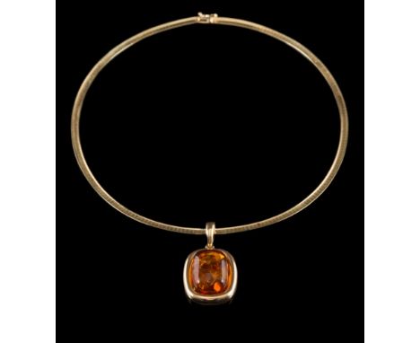 An amber coloured cushion-shaped, single-stone pendant: the reverse stamped 'Halberstadt 585', approximately 31mm long (not i