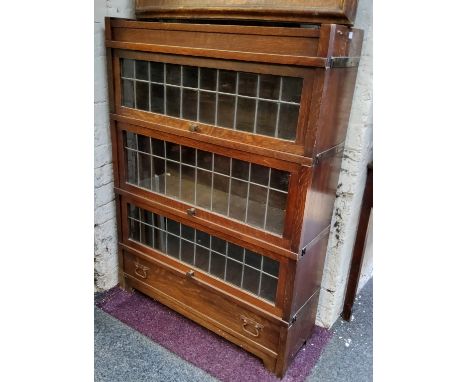 A Globe Wernicke style oak four section barrister's bookcase 