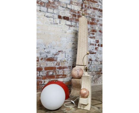 An unusual contemporary ceramic floor lamp with conforming table lamp (af); an opaque glass globe table lamp; a red enamel la