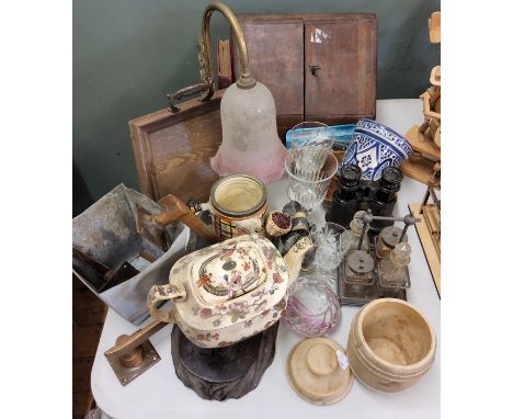 A Victorian oak slope front stationery box, 23cm high, 30cm wide, c.1880;&nbsp; a brass scroll arm wall light, frosted glass 