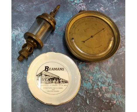 A late 19th century Aneriod barometer, brass drum case, with thermometer, 12.5cm diam;&nbsp; a steam engine oiler, 17cm high;