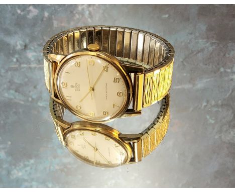 A Tudor Royal Shock Resisting 9ct gold gentleman's wristwatch, silvered dial, gold coloured Arabic numerals &amp; hands, engr