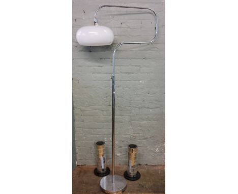 An Art Deco chrome stand lamp, domed white shade, c.1930;&nbsp; two mirrored cylindrical glass vases, stepped balck bases, 39