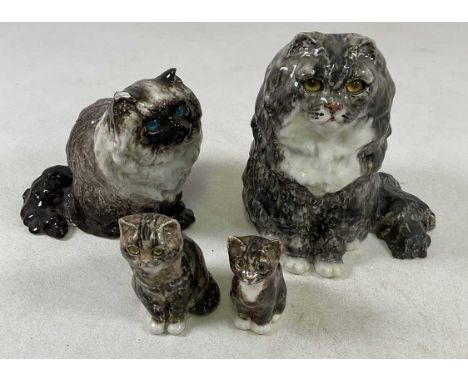 WINSTANLEY; four pottery cats, including a Persian cat, signed and marked number 6 to base, 28cm, together with a similar cat