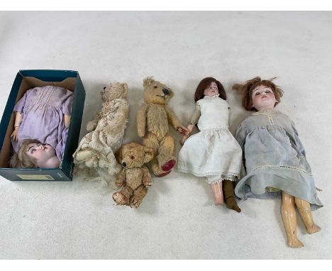 ARMAND MARSEILLE; a bisque headed doll, length approx 50cm, two further bisque headed dolls and four vintage teddy bears.