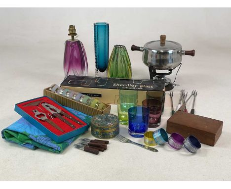 An art glass lampbase, two art glass vases and a selection of drinking glasses, together with a fondue set, tablecloth, napki