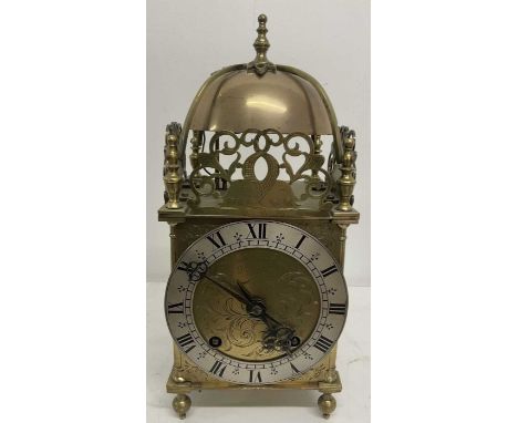 A circa 1900 brass lantern clock, the eight day movement by Winterhalder &amp; Hofmeier, and retailed by Edward &amp; Sons of