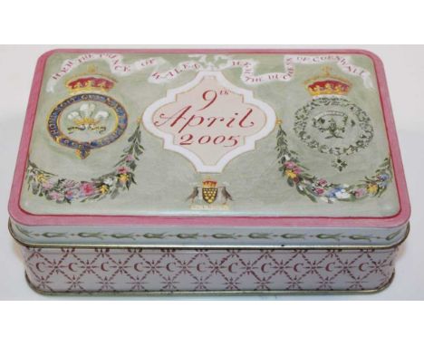 HIS MAJESTY KING CHARLES III AND QUEEN CAMILLA (WHEN HRH PRINCE CHARLES AND DUCHESS OF CORNWALL); a piece of wedding cake pre