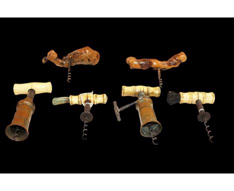 Four Victorian bone handled corkscrews, two with patent plaques, one missing the side ratchet handle, various conditions (4).