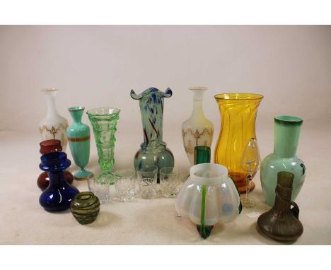 A quantity of decorative glassware, including a large spiral decorated amber coloured glass vase, a Loetz style bowl, etc.
