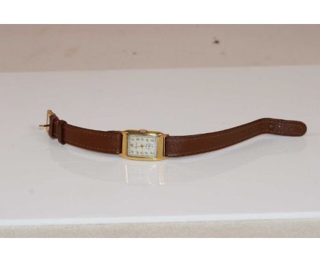 MOVADO; a 1930s gentleman's 18ct yellow gold wristwatch, with Arabic numerals and subsidiary seconds dial to the silvered mai