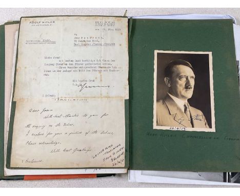 An interesting autograph book containing many signatures, photographs and letters, including a signed photograph and accompan