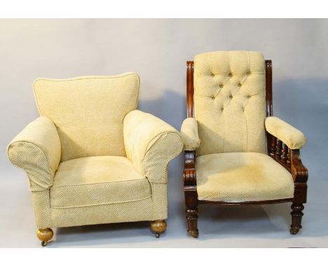 A Victorian mahogany framed armchair, with button upholstered back and padded arms, on turned legs, re-upholstered in oatmeal