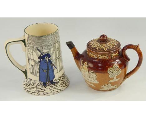 A Doulton Lambeth ware stoneware teapot, depicting toping and hunting scenes, and a Royal Doulton tankard No D4746, (2)