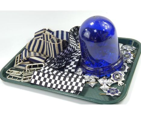 Police interest, including badges, hat trims, blue light cone, etc