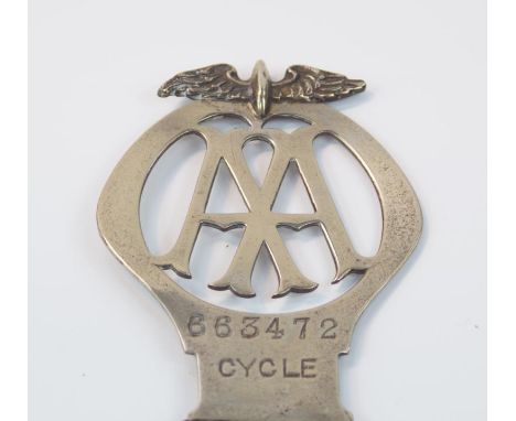 An Automobile Association cycle membership badge, Membership No 663472, registered to The AA, New Coventry Street, London, NW