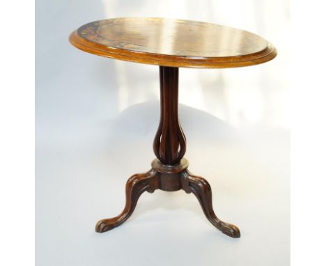 A Victorian walnut and mahogany oval occasional table, with figured walnut and marquetry tilt top, on a cluster column and tr