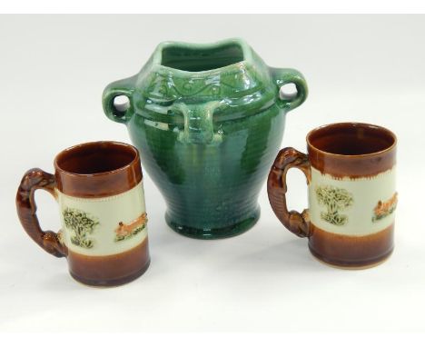 A pair of Denby Bourne tankards, depicting hunting scenes with a Denby ware flagon style vase