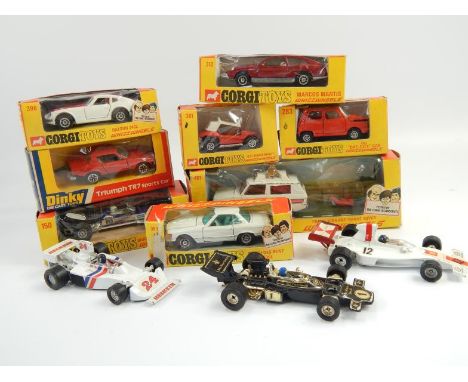 Corgi diecast model cars, including four Formula 1 racing cars, police vigilante, Range Rover, Mercedes Benz 350SL, and other