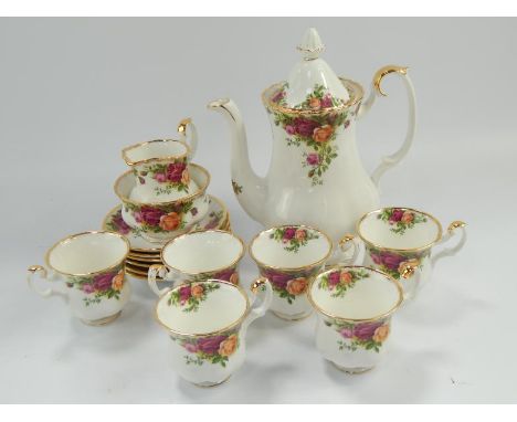 Royal Albert Country Roses coffee service, including a coffee pot, cream jug and sugar basin, six cups and saucers