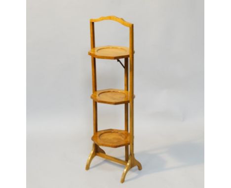 A light oak three tier folding cake stand