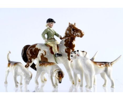 Beswick hunting group, comprising boy and girl rider with four hounds, (AF)