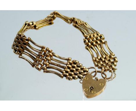 A 9ct gold gate bracelet, with padlock clasp, 21g.