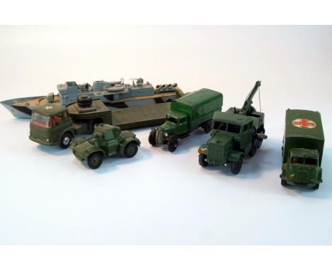 Dinky Military vehicles, comprising military ambulance, armoured car, covered wagon, a Corgi Toys Bedford tractor unit with C