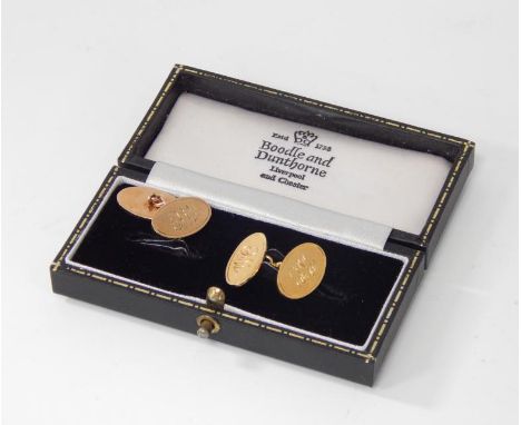 A pair of plain oval gold cufflinks, initialled WC, one 18ct gold the other 9ct gold, in Boodle & Dunthorpe original case, 7g
