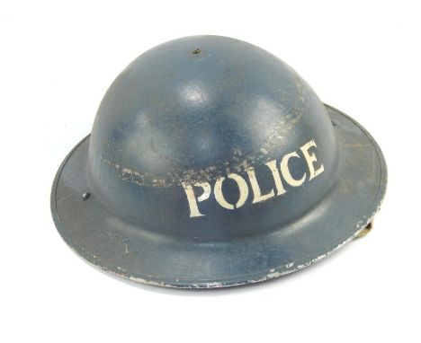 A WWII period Police tin helmet