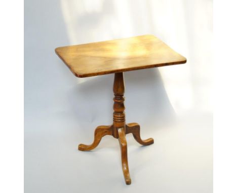 A small Georgian rectangular mahogany tripod table, with tilt top