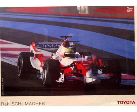 A framed motor racing print of Ralf Schumacher, in a Toyota Formula 1 car, framed, 60cm x 80cm
