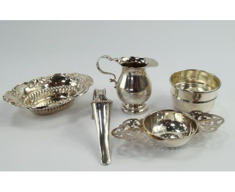 A late Victorian silver helmet shaped cream jug, of small proportions, Birmingham 1898, and other silver items including a te