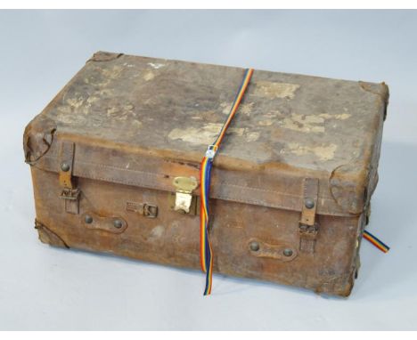 A vintage leather cabin trunk