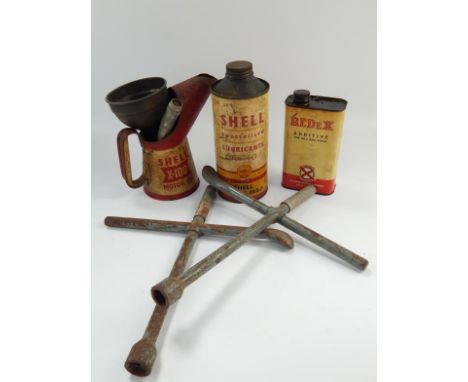 Vintage Shell Motor Oil cans and two wheel braces