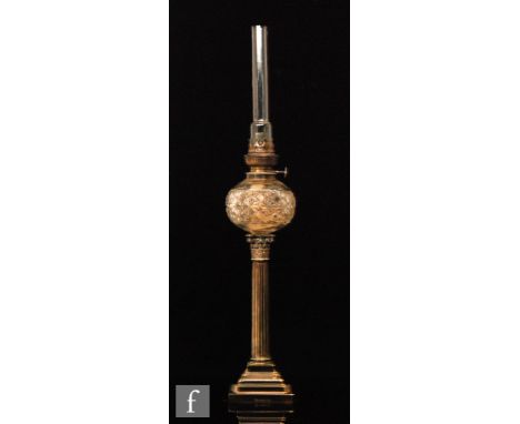 An early 20th Century Elkington plated corinthian column table lamp with cut glass reservoir on a stepped base, height 41cm