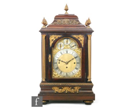 A late 19th to early 20th Century twin fusee musical bracket clock striking on eight graduated bells and five gongs, the arch