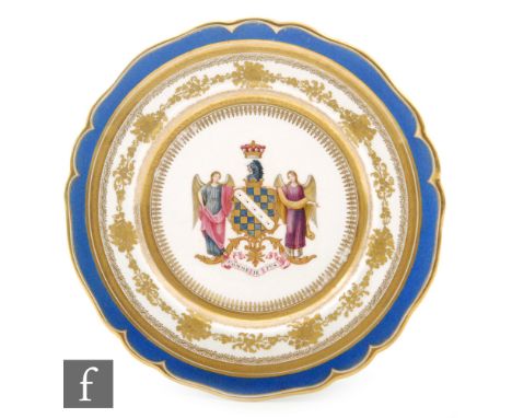 An early 19th Century Chamberlain Worcester plate enamelled decorated to the centre with the armorial crest 'Comme Je Fus' (A