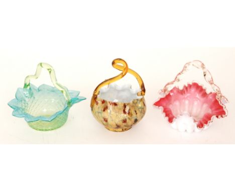 A late 19th Century Stourbridge glass posy basket, the flower form base with an applied pale green handle, decorated with dia