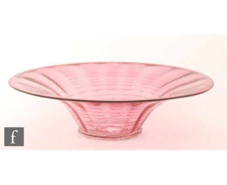 A 1930s Whitefriars glass threaded bowl designed by Barnaby Powell, pattern 8266, of flared form with ruby trailing over a ru