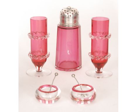 A ruby glass sugar shaker with silver plated top, together with a pair of small table salts and a tumbler vase, tallest 13cm.