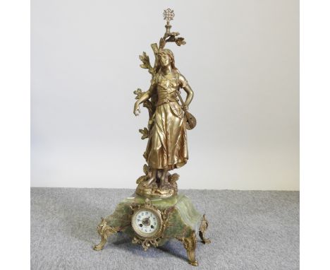 A 19th century French gilt spelter figural mantel clock, on a green marble base, inscribed Mignon, par Bruchon, the eight day