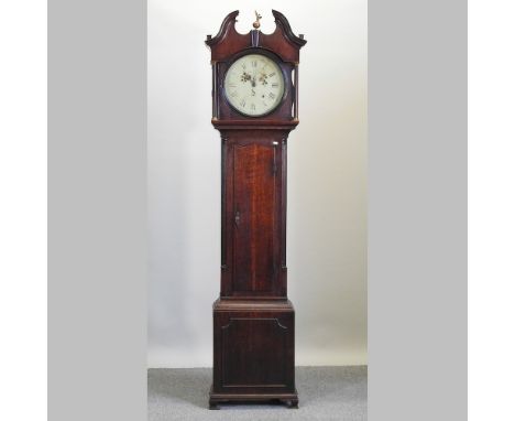 A George III oak cased longcase clock, having a painted circular dial and thirty hour movement, 217cm