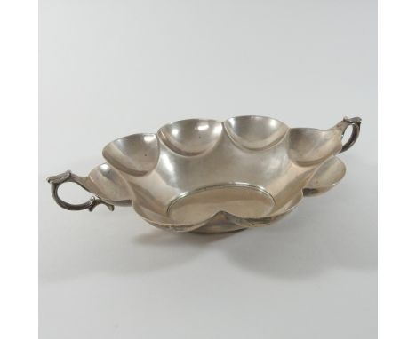 A Victorian silver twin handled dish, of lobed oval shape, inscribed Millar Wilkinson St. Michaels Alley, Cornhill, London 18